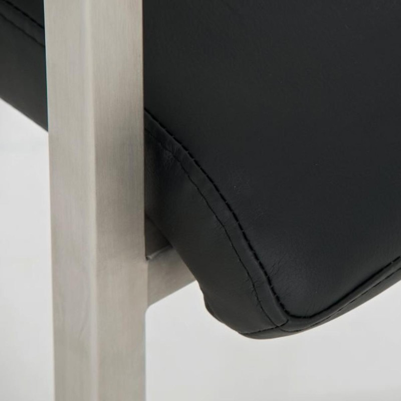 Silla de confidente OWEN. Exclusivo y moderno diseño con estructura en acero inoxidable y tapizada en piel negra