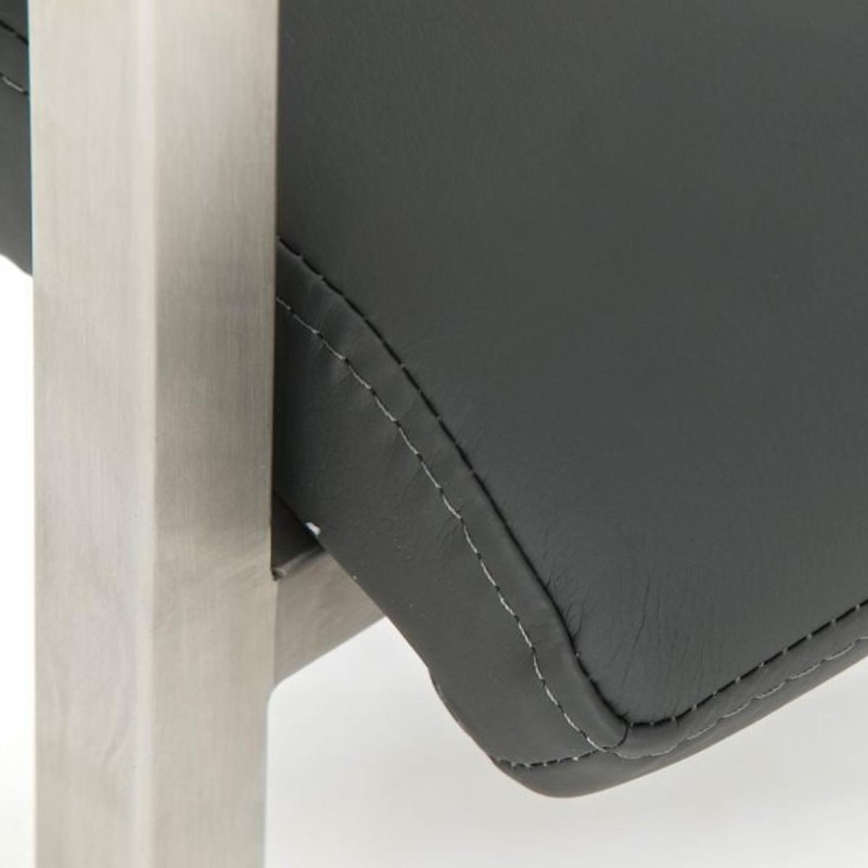 Silla de confidente OWEN. Exclusivo y moderno diseño con estructura en acero inoxidable y tapizada en piel negra
