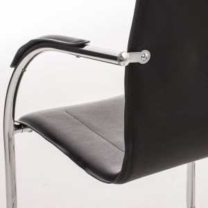 Sillas de confidente FLAP, estructura metálica y elegante diseño en piel color negro